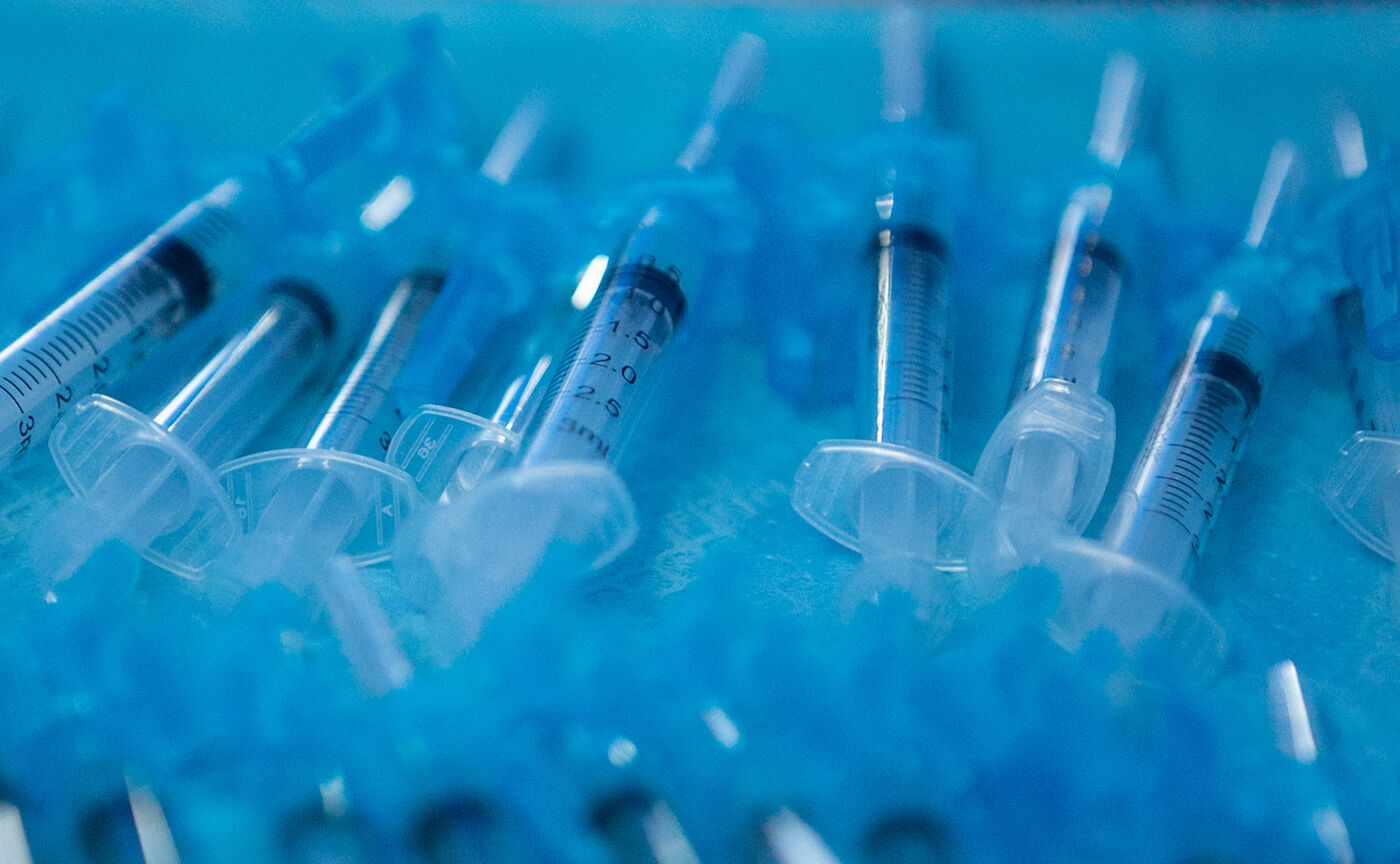 Vaccine syringes